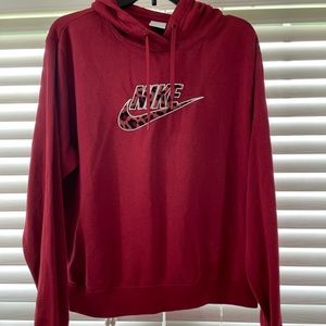 Nike, red/burgundy. Medium. New.